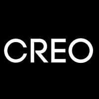 The letters CREO
